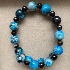 NWOT Black and blue beaded bracelet.